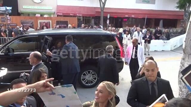 Madison Iseman signs for fans outside the Annabelle Comes Home premiere at Regency Village Theatre in Westwood