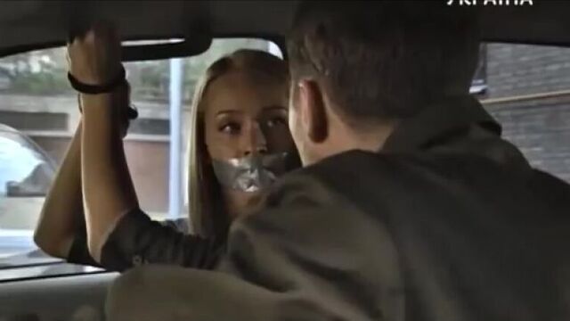Girl handcuffs the car up