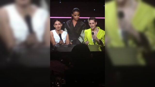 Naomi, Kristen, and Ella honoring Elizabeth Banks