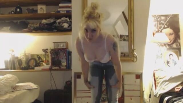 Wetting Light Blue Jeans