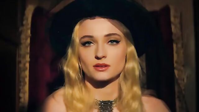 Sophie Turner gets her tiny tits rubbed with oil on the beach