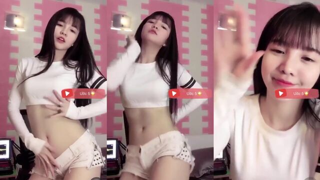 Hot Asian girl shakes big ass while dancing