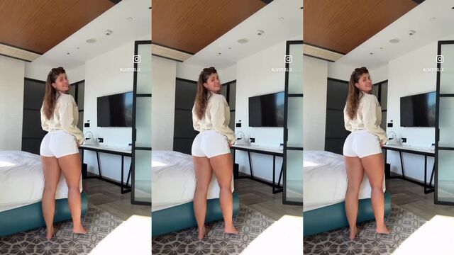 A sexy fit Latina shakes her big ass and strong legs in a bikini