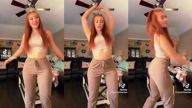 The cheerleader is twerking and shaking her fat ass in the video