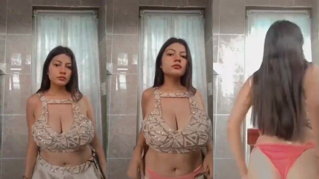 Natural busty Latina babe Paola shows off her big natural boobs and ass