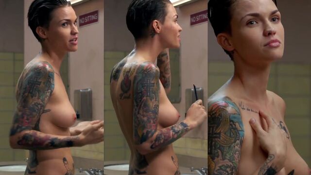 Ruby Rose and Ash Hollywood in intense lipstick kiss action