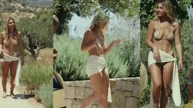 Hot blonde Madalena does a sensual dance on the banks outside