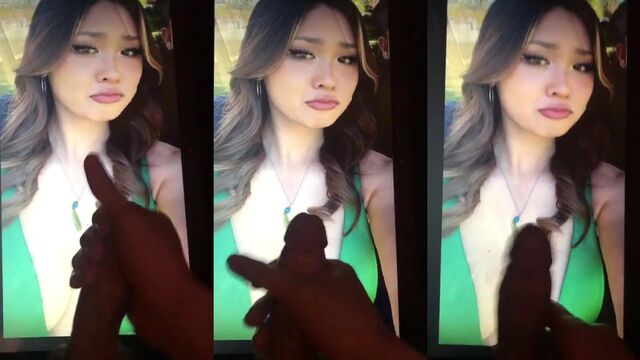 A huge tit Asian beauty gets a cum tribute while she talks dirty