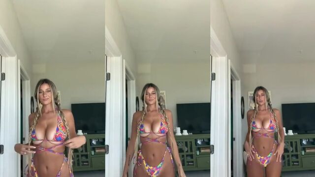 Thick white girl shows off her big boobs and ass in bikini