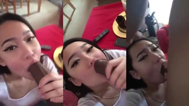 Asian beauty gives a deepthroat blowjob to her BBC lover