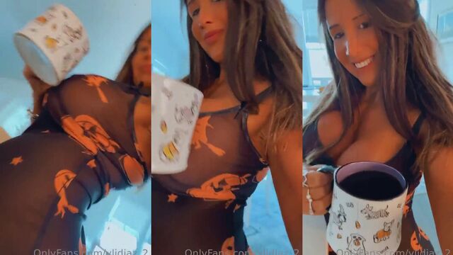 Latina bimbo with huge fake tits and ass shakes them on the pole