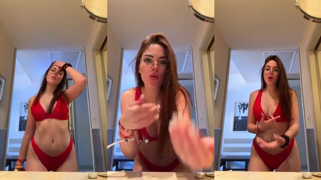 A Spanish girl is having fun with her friend in the kitchen, speaking in Spanish
