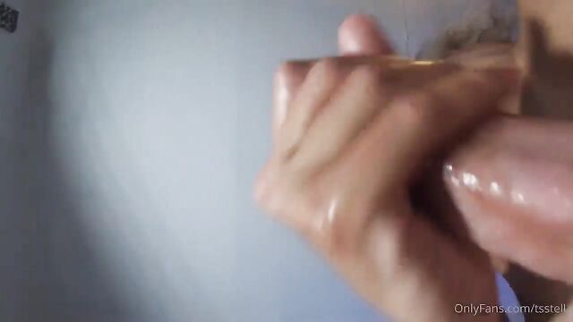 Skinny Asian shemale moans while fingering her ass with a dildo until she cums
