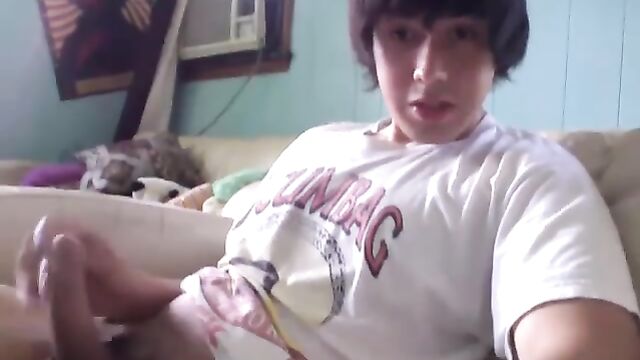 Hot Latino guy Lucas masturbates his big uncut cock on webcam