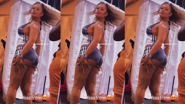 A sexy girl with a big ass shows her shaking skills in the kitchen