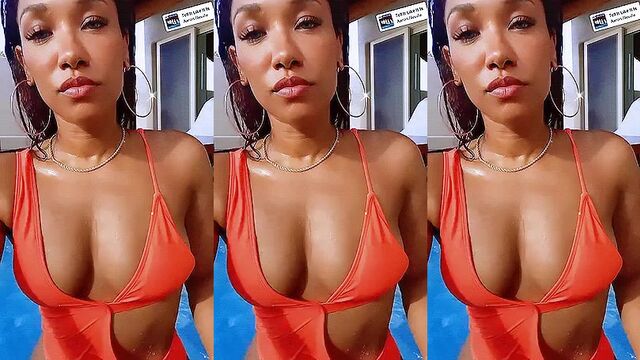 Candice Patton is a sexy ebony actress with impressive big boobs