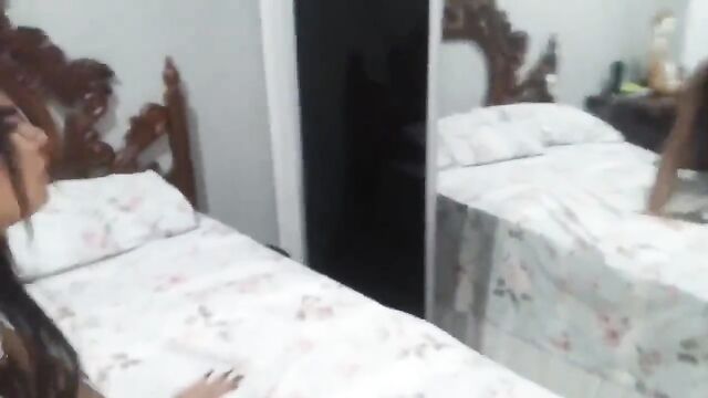 Two hot shemales are fucking on the bed without any problems
