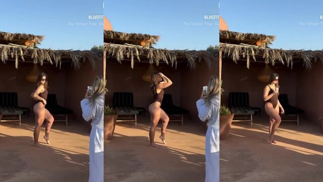 A sexy fit Latina shakes her big ass and strong legs in a bikini