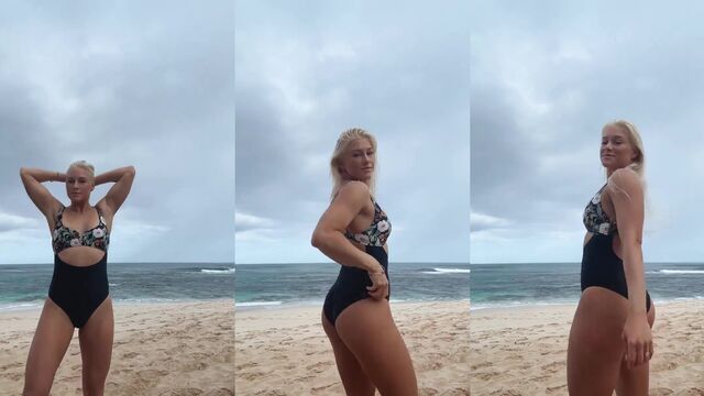 Surfista brasileira Tati West loira se diverte em casa