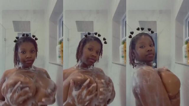 Lizzie’s gorgeous ebony breasts bounce while she plays with her phat pum pum