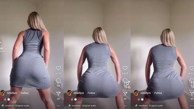 A sexy girl twerks on the bed with her ass facing the camera