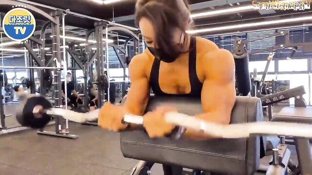 Female Bodybuilder Nikkita Fitness shows her huge biceps and boobs