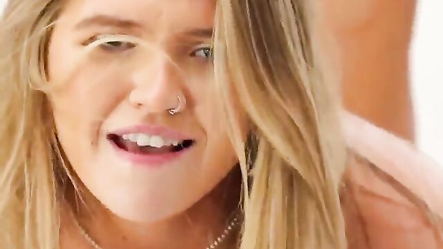 Blonde woman fucks doggy style with her husband