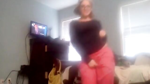 A cute girl is dancing sexy twerk in the shower