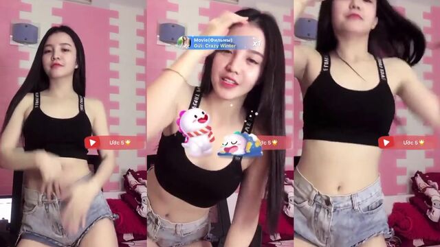 Hot Asian girl dances sexy and spreads her legs wide