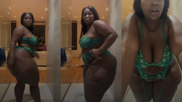 A fat black woman shows off her big ass and shakes it hard