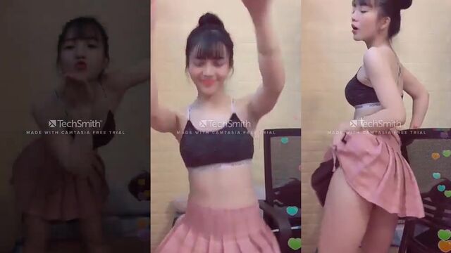 Hot Asian girl dances and spreads her legs to show everything