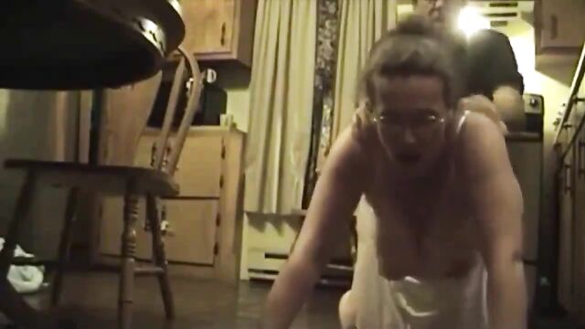 A mature woman and her husband share their intimacy with others in a daring act