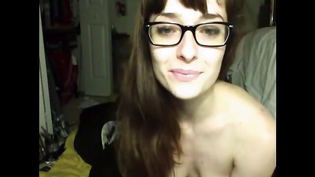 A naughty waitress talks to the camera while she's having an orgasm