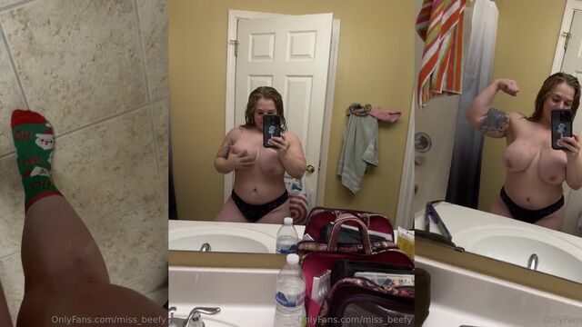 Fit MILF with huge boobs does pec flexing and bicep curls in the gym