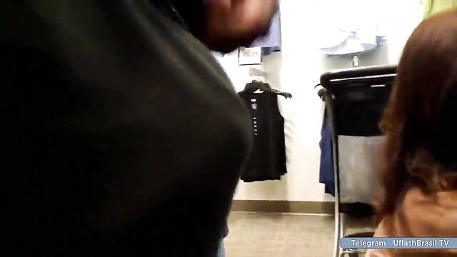 A woman with a big ass is flashing in public place