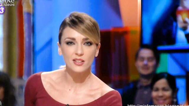 Anna Simon showcases her big tits while working as a TV presenter in Spain