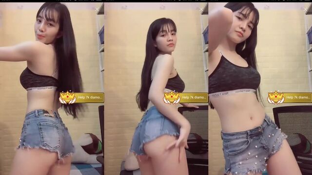 Hot Asian girl dances and spreads her legs to show her sexy body