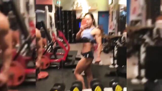Female bodybuilder Nikkita Fitness enjoys playing with her dildo in sexy poses