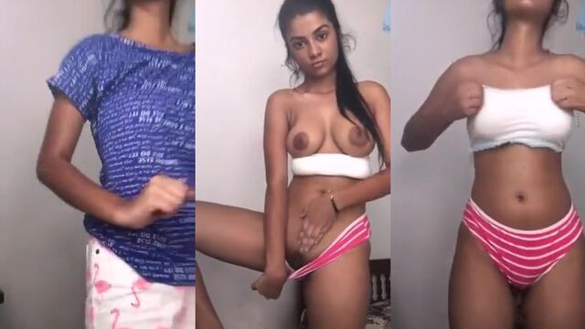 An Indian girl is masturbating herself using her fingers to get pleasure