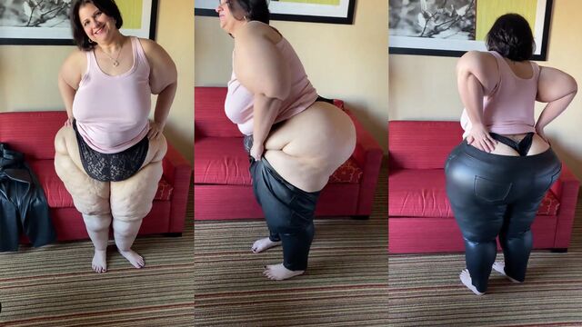 The fat ass of the BBW is being admired and spanked in this scene