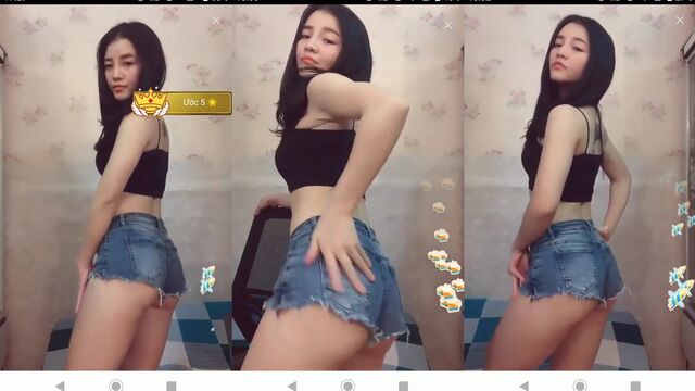 Hot Asian girl dances and spreads her legs to show her sexy body