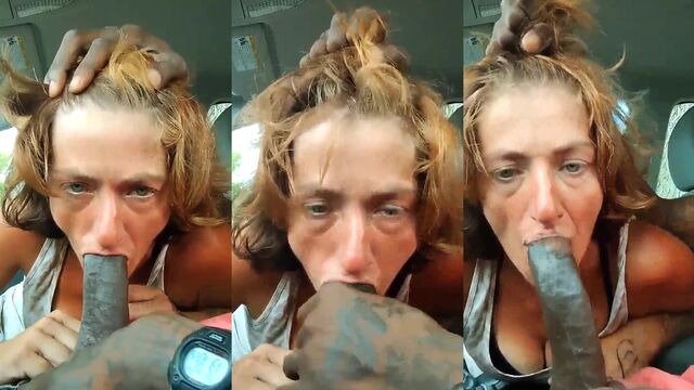 A homeless crack head gets a BBC in his mouth in the backseat