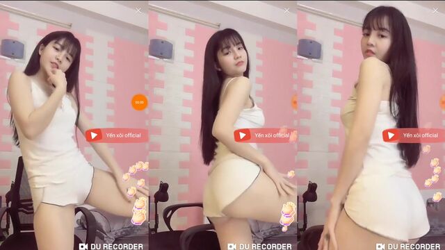 Hot Asian girl dances and spreads her legs with passion