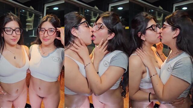 Two sisters are having fun with each other without clothes