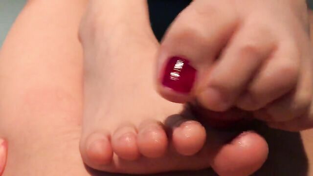 Korean hottie gets her feet worshiped and gets a hot load on them