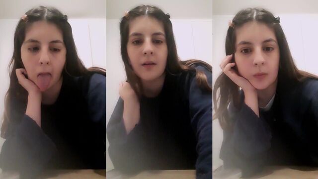 A young Chilean girl shows her body in a private Skype cam show