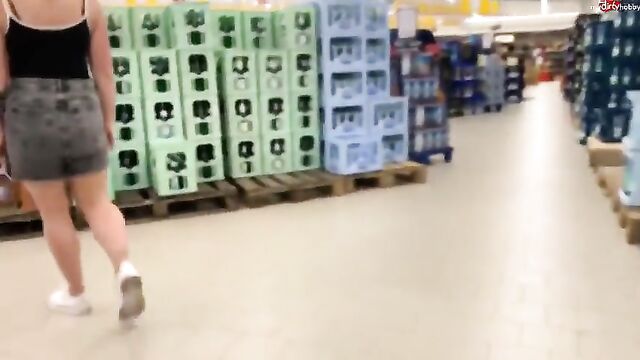 A naughty girl pees in public, matching her daring spirit