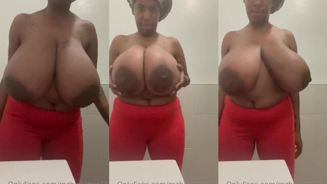 Ebony woman with big tits has milk for the baby