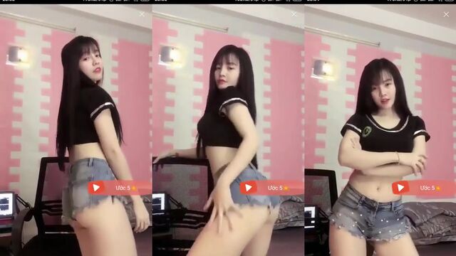Hot Asian girl dances and spreads her sexy legs