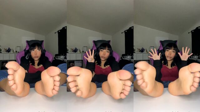A sexy Latina gives a footjob with her hot soles
